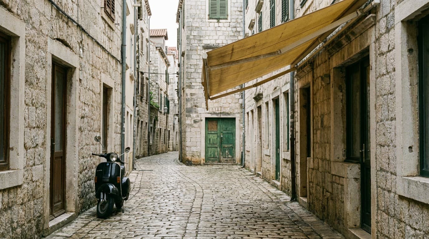 A different street with a yellow awning on the right, a scooter on the left and a green door, showing drift